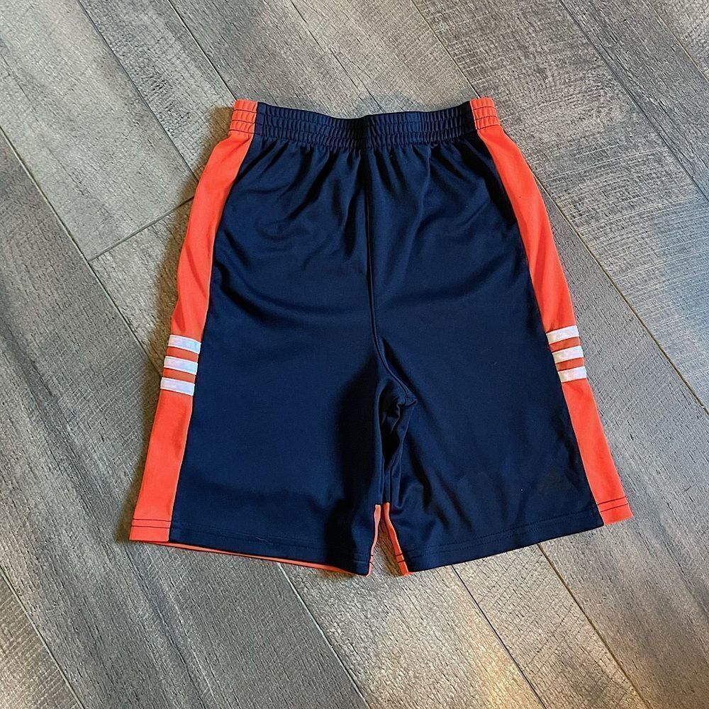 Youth Adidas, Blue and Orange Athletic Shorts. Size 7.